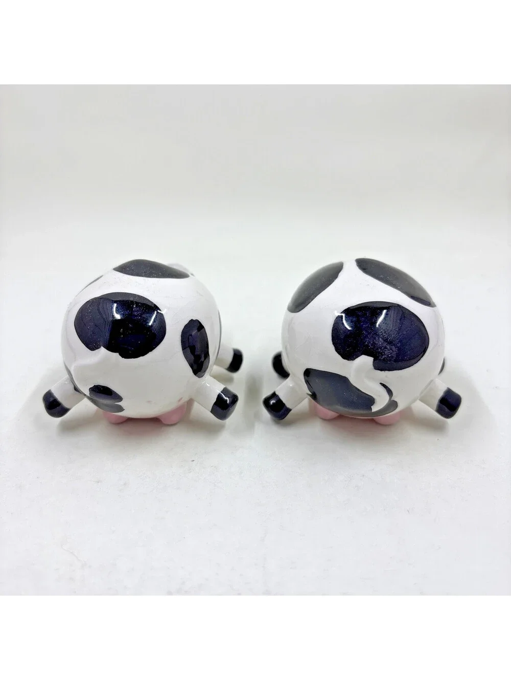 Farmhouse Style Mini Cow Salt and Pepper Shakers Resting on Utters 2.5